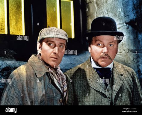  The Adventures of Sherlock Holmes -  a captivating mystery series starring Basil Rathbone and Nigel Bruce!